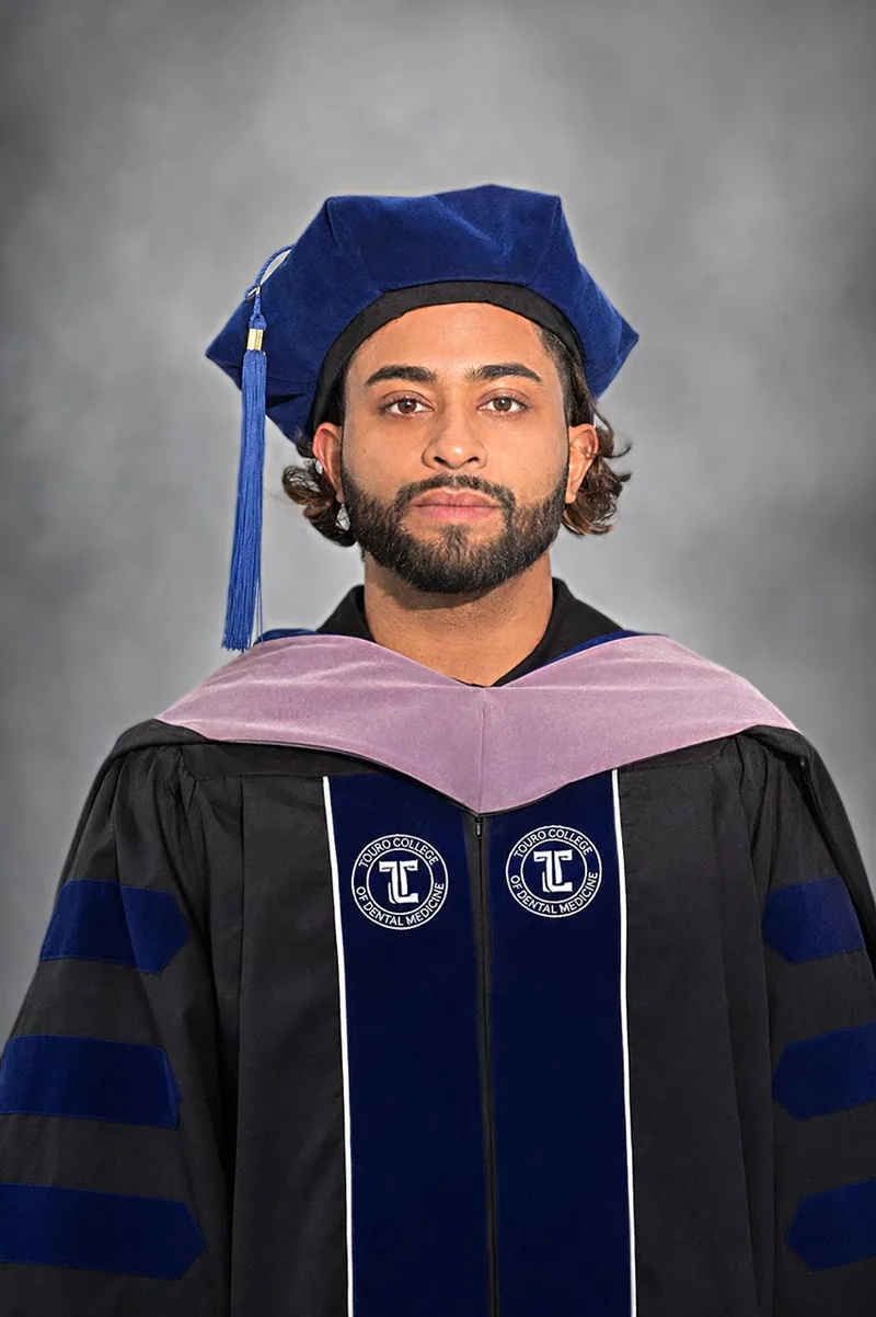 Dr. Nahian Hussain in his Touro College of Dental Medicine graduation regalia