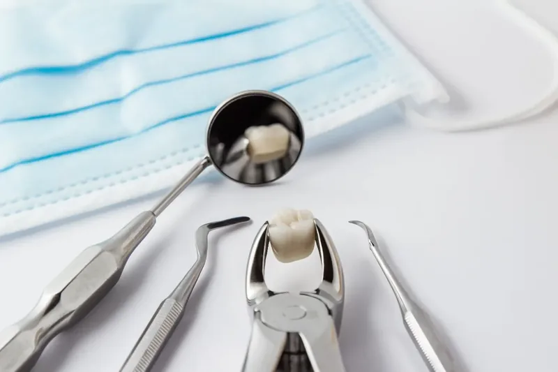 Dental extraction instruments on a tray